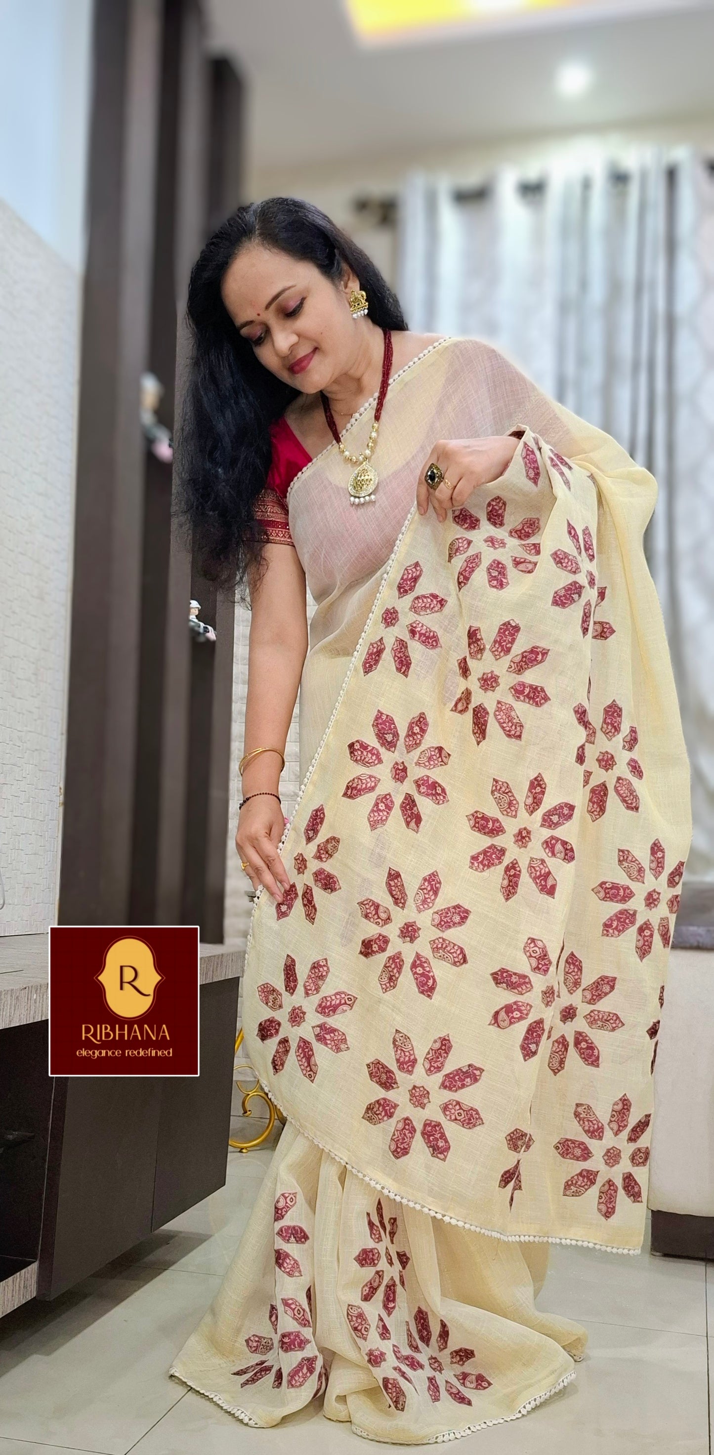 Cream colour tissue saree with pink aplic work